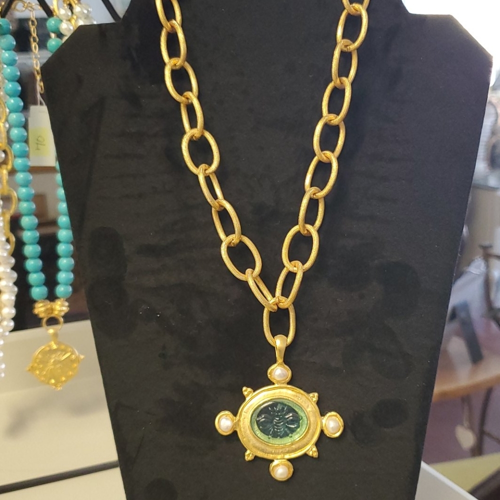 Green glass bee medallion necklace